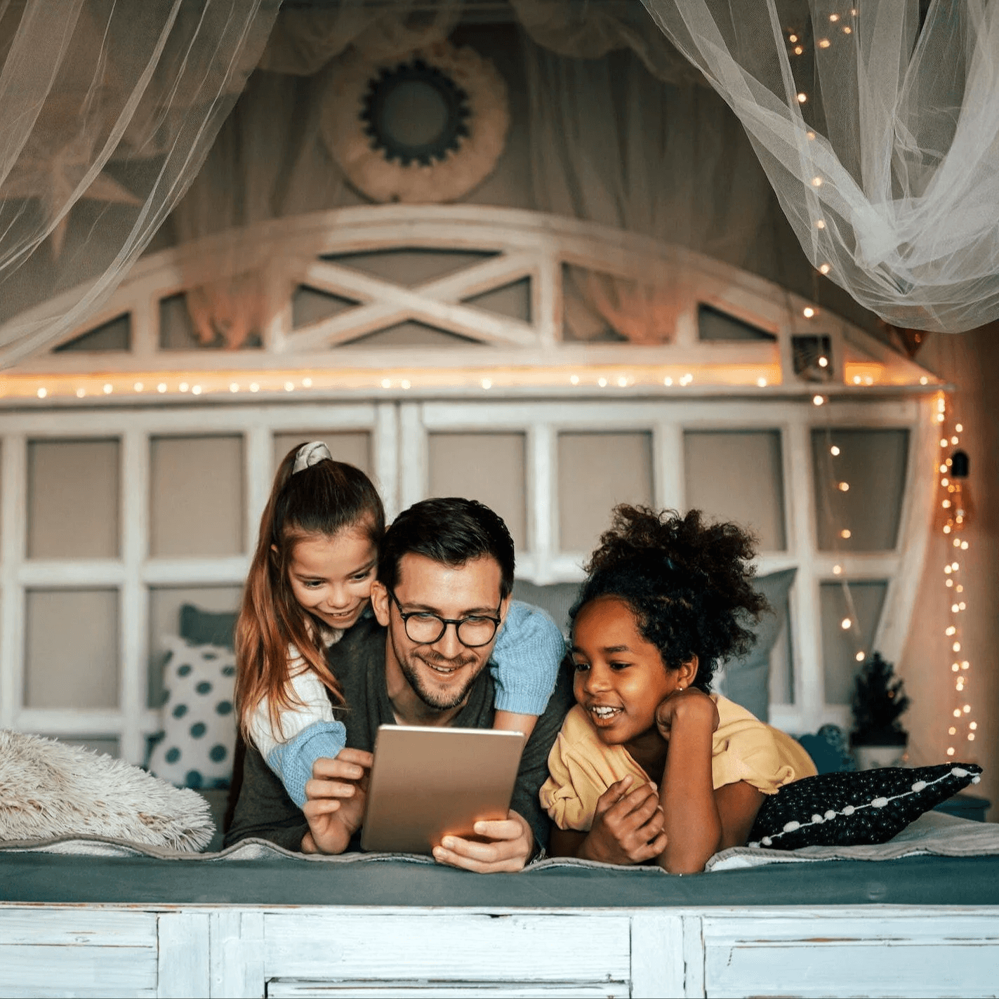 A family using a tablet together at home